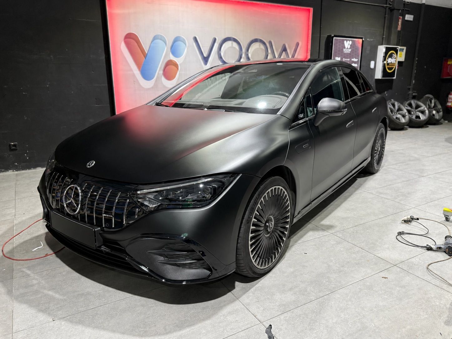 Matte black Mercedes EQS luxury sedan in the Barcelona Transferz fleet